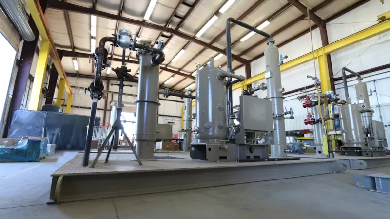 A photo of a Vapor Recovery Unit (VRU) from Power Service, A DNOW Company, used to capture and recover vapors from oil and gas production facilities. A photo of a Vapor Recovery Unit (VRU) from Power Service, A DNOW Company, used to capture and recover vapors from oil and gas production facilities.